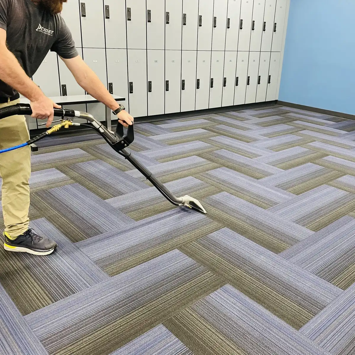 Gym & Fitness Center Cleaning. Premier Cleaning, LLC cleaning gym locker floor.